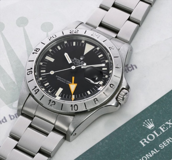 A fine and attractive stainless steel wristwatch with date, 24 hour indication, bracelet and service papers